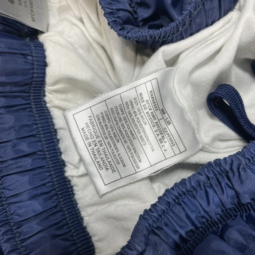 Vintage Nike Youth M (8-10) Blue Nylon Track Pants Zip Ankle Cinch Waist Retro